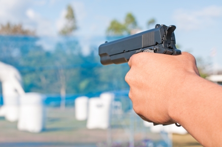 Hand with gunの写真素材