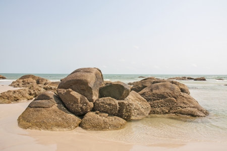 sea with brown rocks at sunny day の写真素材