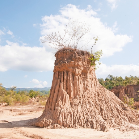 Ancient corrosion of soil by rain and wind at Kork Suo,Nan,Thailandの写真素材