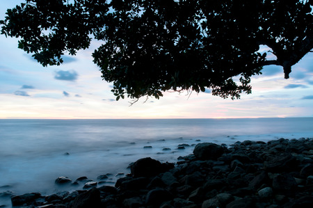 Tropical beach at beautiful sunset. Nature background