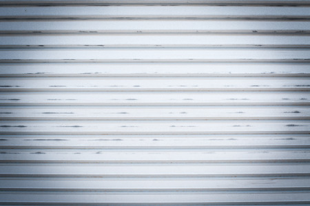 grunge metallic roller shutter door, backgroundの写真素材