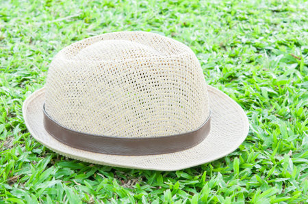 hat on grass