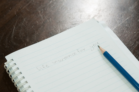 Text "life insurance for you" on notebook.の写真素材