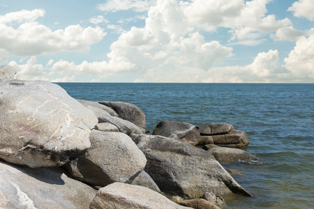 Rocks , sea and blue skyの写真素材