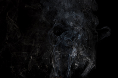movement of white smoke on black backgroundの写真素材