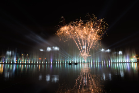 fireworks with reflection in the lakeの写真素材