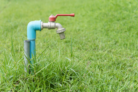 Closeup old faucet in the gardenの写真素材