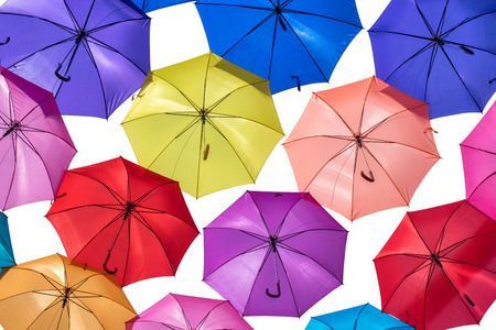colored umbrellas isolated on white backgroundの写真素材