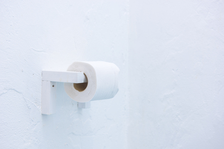 Close-up of tissue paper roll in bathroomの写真素材