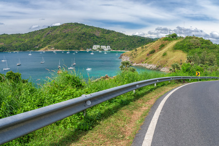 Asphalt road and sea in Phuket, Thailand.の写真素材