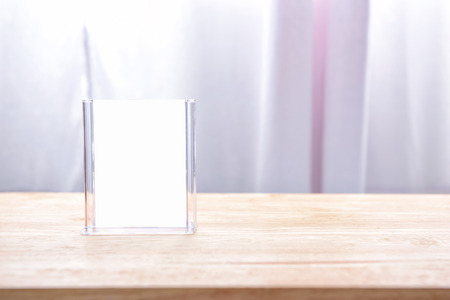 Table tent on wooden tableの写真素材