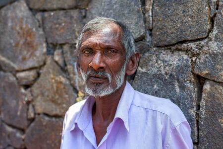 KANDY, SRI LANKA - MARCH 17 : Portrait of close up of long beard and mustache man stand at market on March 17, 2016 in Kandy, Sri lanka.のeditorial素材
