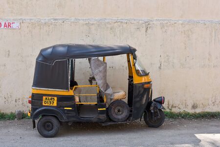 KERALA, INDIA - May 07, 2018 : Indian Tuk Tuk taxi running for passenger service on the road in...