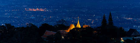 Panoramic Wat Phra That Doi Suthep on mountains at twilight in Chiang Mai, Thailand.の写真素材