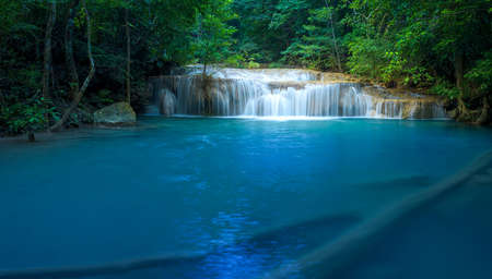 Panoramic beautiful deep forest waterfall in Thailandの写真素材