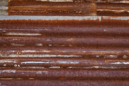 Rusted galvanized iron plate backgroundの写真素材