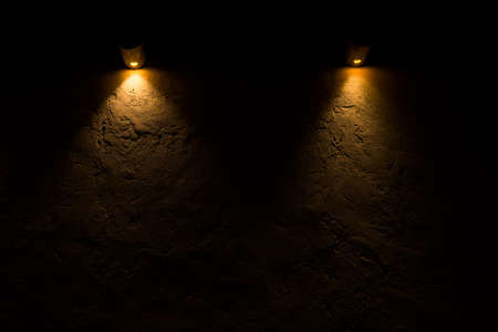 Lamp shines on the wall.の写真素材