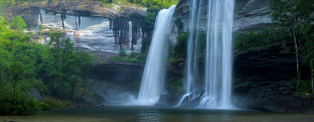 Panoramic beautiful Huai Luang Waterfall and rock cliff in deep forest at Phu Chong Na Yoi National...