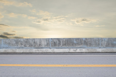 Side view of asphalt road with beautiful sunset sky.の写真素材