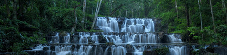 Panoramic beautiful deep forest waterfall in Thailand