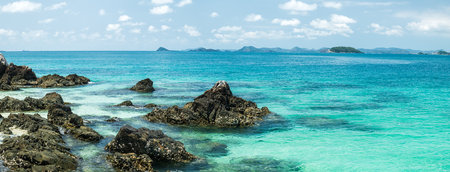 Beautiful seascape with blue sky on a sunny day. Nature background. Sea surface in sun light. Relaxing natural photo wallpaper. Teal blue ocean view. Breezy wavy seawater.の写真素材