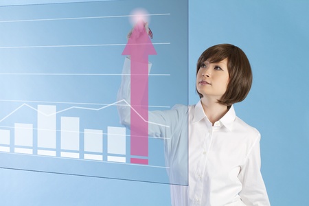 Beautiful business woman pushing touch screen. の写真素材