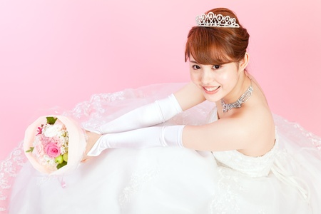 Beautiful asian woman dressed as a brideの写真素材