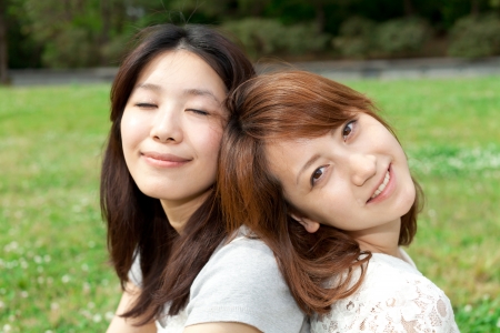 Beautiful young woman in the parkの写真素材