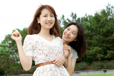Beautiful young woman in the parkの写真素材