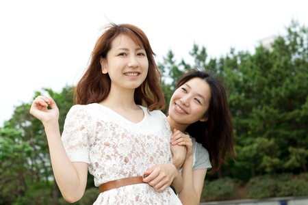 Beautiful young woman in the parkの写真素材