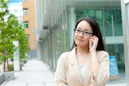 Beautiful business woman outdoorの写真素材