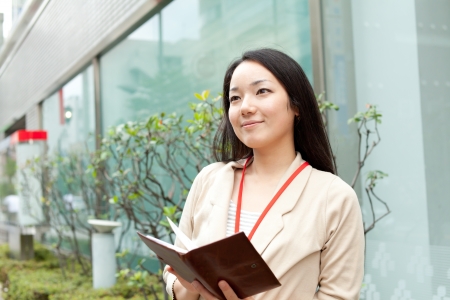 Beautiful business woman outdoorの写真素材