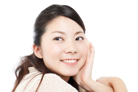 Beautiful young woman on white backgroundの写真素材