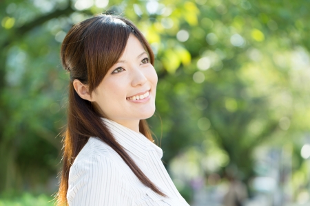 Beautiful businesswoman in the townの写真素材