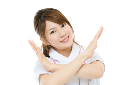 Beautiful asian nurse on white backgroundの写真素材