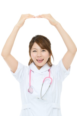 Beautiful asian nurse on white backgroundの写真素材