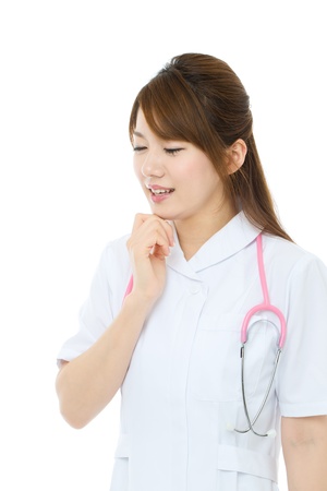 Beautiful asian nurse on white backgroundの写真素材