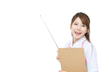 Beautiful asian nurse on white backgroundの写真素材