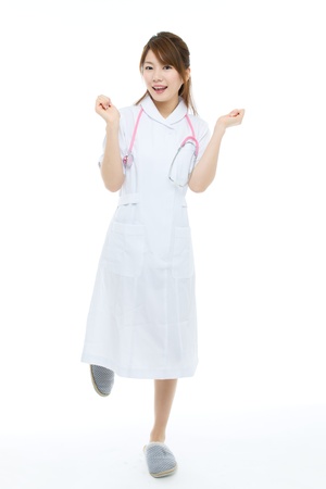 Beautiful asian nurse on white backgroundの写真素材
