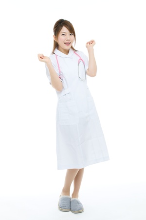 Beautiful asian nurse on white backgroundの写真素材