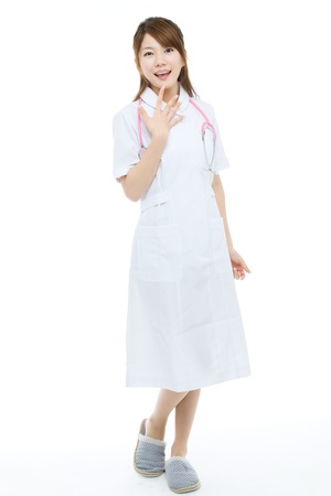 Beautiful asian nurse on white backgroundの写真素材