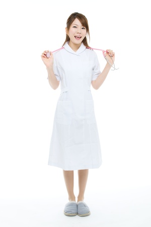 Beautiful asian nurse on white backgroundの写真素材