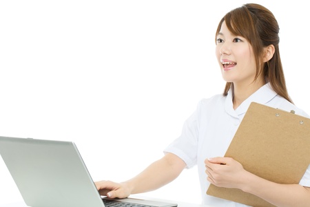 Beautiful asian nurse on white backgroundの写真素材