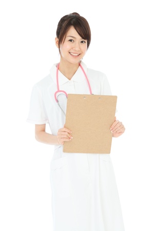 Beautiful asian nurse on white backgroundの写真素材