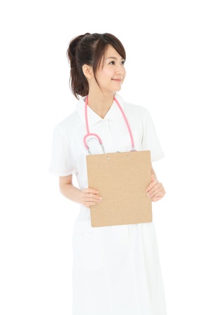 Beautiful asian nurse on white backgroundの写真素材