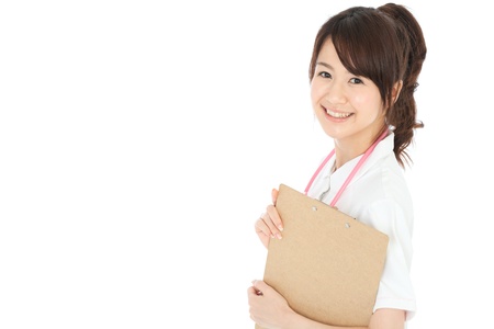 Beautiful asian nurse on white backgroundの写真素材