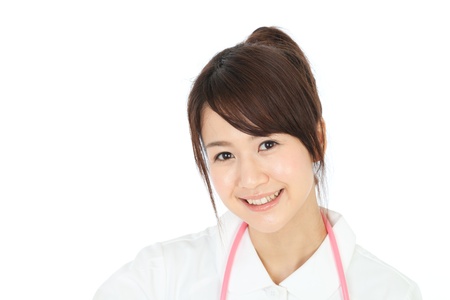 Beautiful asian nurse on white backgroundの写真素材