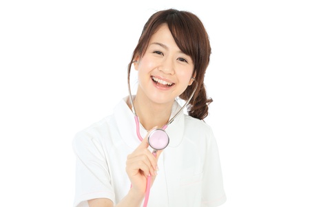 Beautiful asian nurse on white backgroundの写真素材