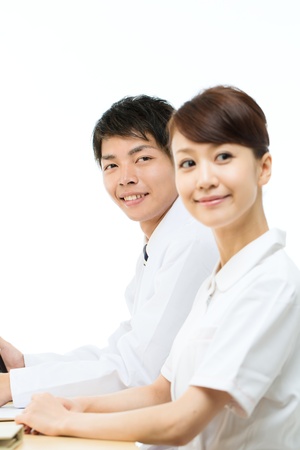 Asian young medical doctor isolated on white backgroundの写真素材