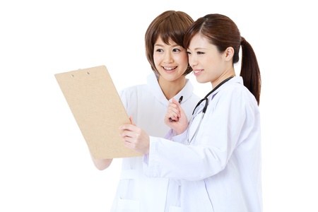 Asian young medical doctor isolated on white backgroundの写真素材